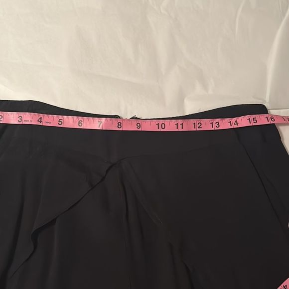 Black palazzo pants that look like a split maxi skirt, side leg has slit. - Picture 8 of 10